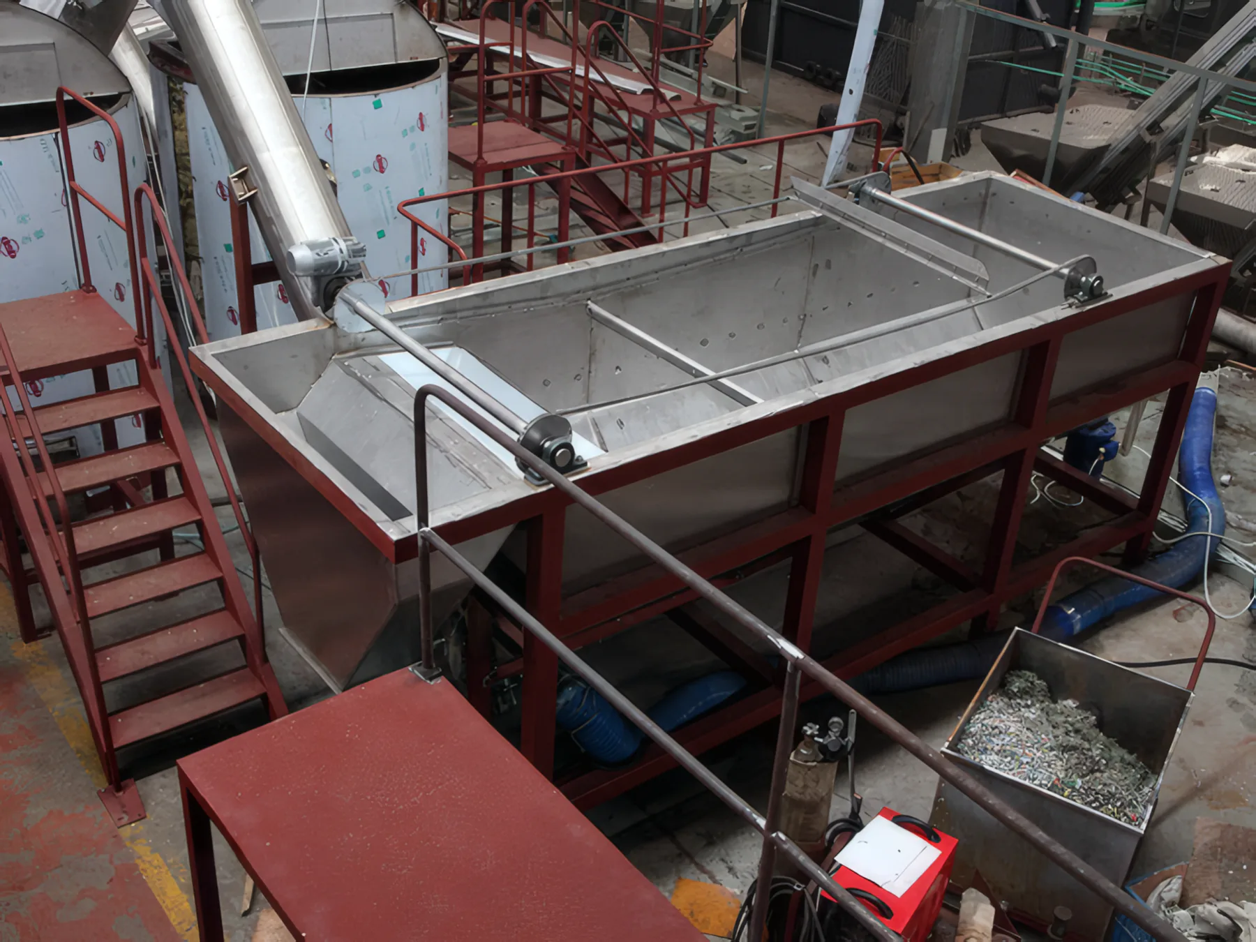 Stainless sink-float tank with steel access stairs