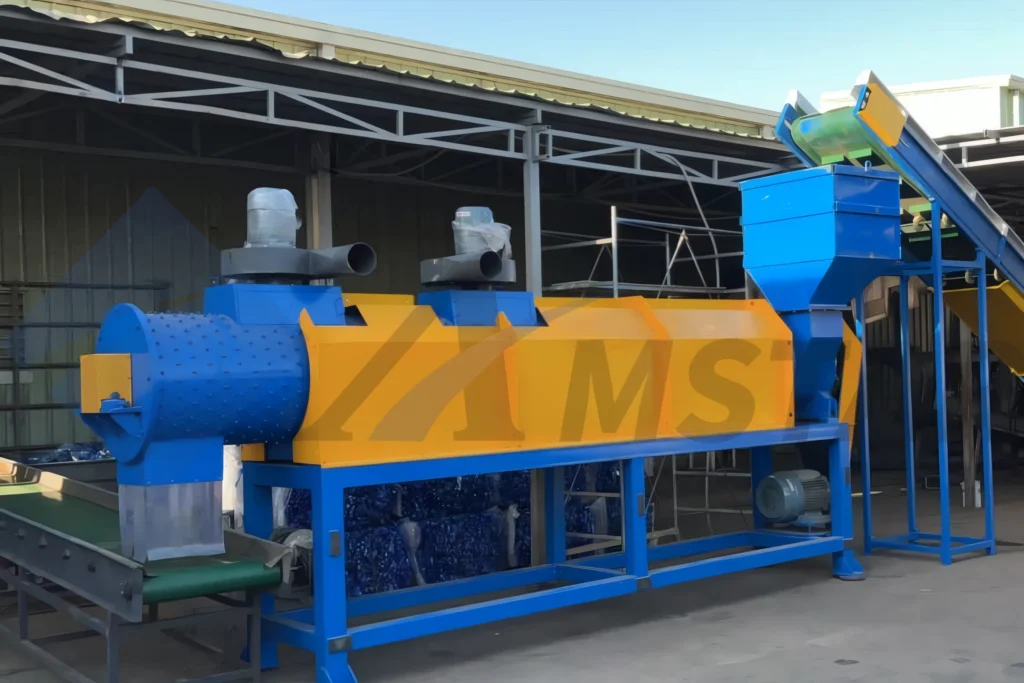 Dry Label Remover – yellow housing with extraction fans and feed hopper