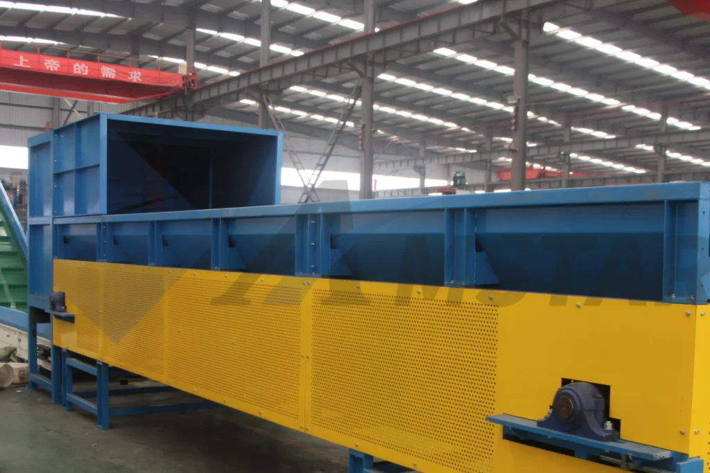 Vertical Debaler For PET Bottle Bales – long blue bale feeder with yellow drive guarding