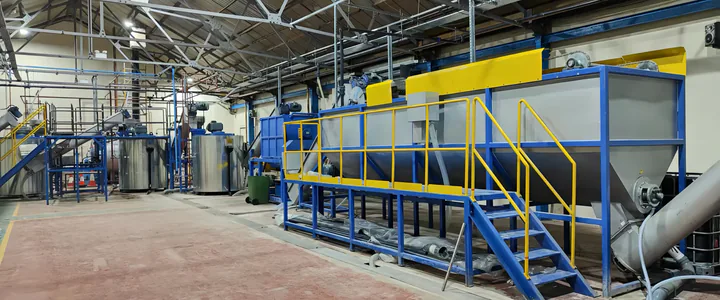 PET bottle washing line – wide factory view of the separation tank and access stairs
